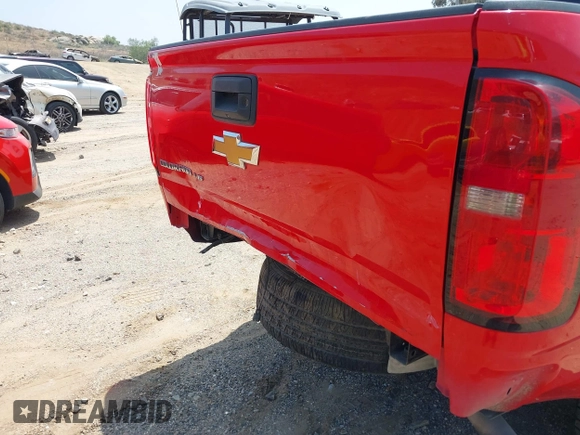 2019 Chevrolet Colorado 2WD Work Truck with VIN 1GCHSBEN3K1100815, listed as a IAAI auction lot 42127659 with Not Provided miles and . Bid and sale history available at DreamBid. Image 19.