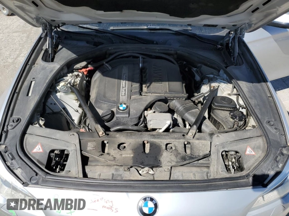 2014 BMW 5 Series 535i xDrive с VIN WBA5B3C59ED530604, выставлен на аукционе Copart как лот 52017335 с пробегом 139 613 миль миль и Списание • Salvage title. История ставок и продаж доступна на DreamBid. Изображение 11.