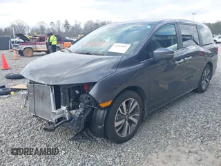 2023 Honda Odyssey Touring with VIN 5FNRL6H86PB065670, listed as a IAAI auction lot 41691093 with 22,518 mi miles and . Bid and sale history available at DreamBid. Image 19.