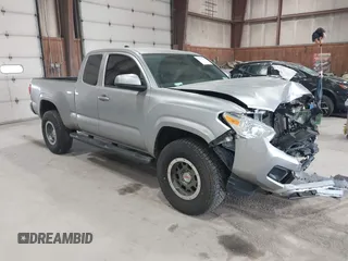 2021 Toyota Tacoma SR z VIN 3TYSX5EN3MT008543, wystawiony jako IAAI lot #42125434 z przebiegiem 71 432 mil mil oraz . Historia ofert i sprzedaży dostępna na DreamBid. Obrazek 1.