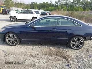 2015 Mercedes-Benz E-Class E 400 with VIN WDDKJ6FB4FF307393, listed as a IAAI auction lot 41775634 with 100,928 mi miles. Bid and sale history available at carsss.com. Image 14.