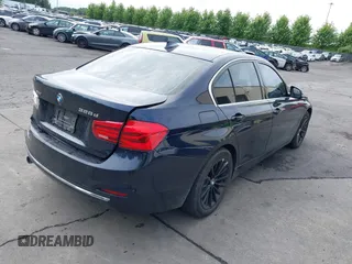 2016 BMW 3 Series with VIN WBA8F1C52GK439095, listed as a IAAI auction lot 42294449 with 309,979 mi miles and . Bid and sale history available at DreamBid. Image 4.