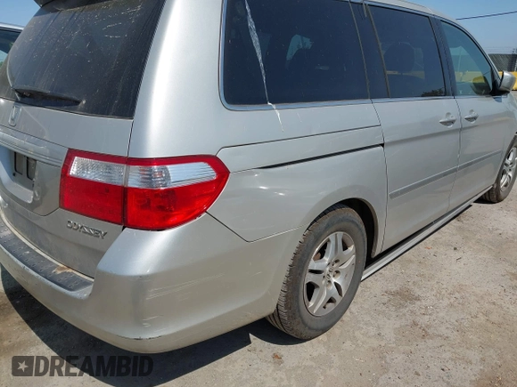 2005 Honda Odyssey EX-L z VIN 5FNRL38765B135803, wystawiony jako IAAI lot #42421288 z przebiegiem 185 043 mil mil oraz . Historia ofert i sprzedaży dostępna na DreamBid. Obrazek 6.