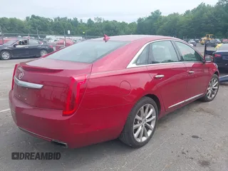 2014 Cadillac XTS Luxury with VIN 2G61M5S3XE9254506, listed as a IAAI auction lot 42611946 with 93,306 mi miles and . Bid and sale history available at DreamBid. Image 4.