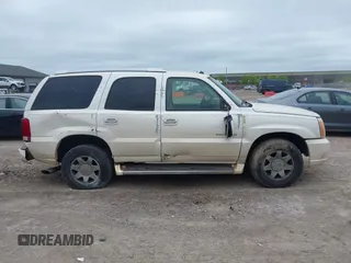 2004 Cadillac Escalade z VIN 1GYEK63N04R207168, wystawiony jako IAAI lot #42348203 z przebiegiem 251 847 mil mil oraz . Historia ofert i sprzedaży dostępna na DreamBid. Obrazek 13.