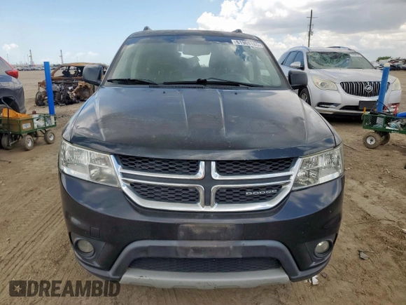 2012 Dodge Journey SXT with VIN 3C4PDCBG9CT208187, listed as a Copart auction lot 61969185 with 156,295 mi miles and Salvage title. Bid and sale history available at DreamBid. Image 5.