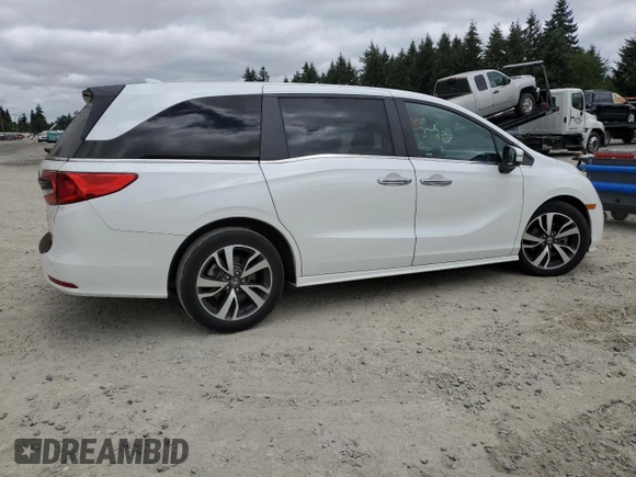 2022 Honda Odyssey Touring with VIN 5FNRL6H8XNB016064, listed as a Copart auction lot 65289595 with 24,946 mi miles and Salvage title. Bid and sale history available at DreamBid. Image 3.