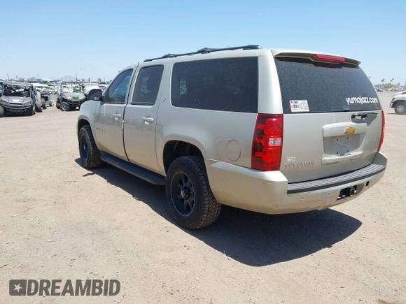 2013 Chevrolet Suburban LT with VIN 1GNSKJE70DR127208, listed as a IAAI auction lot 42285279 with 295,930 mi miles and . Bid and sale history available at DreamBid. Image 3.