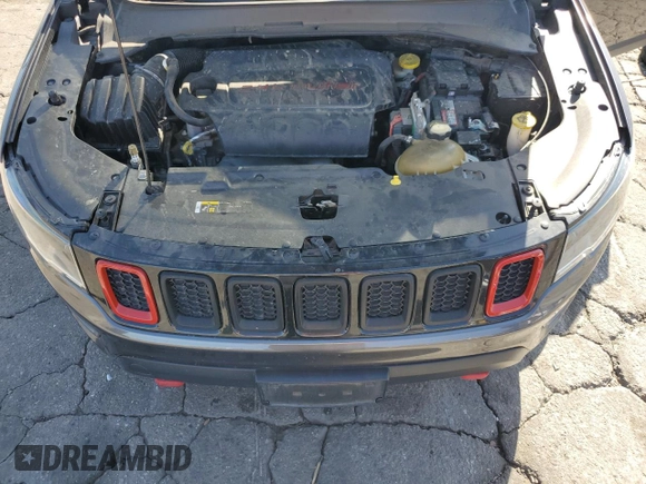 2018 Jeep Compass Trailhawk z VIN 3C4NJDDB0JT130449, wystawiony jako Copart lot #57486015 z przebiegiem 87 318 mil mil oraz Szkoda całkowita • Salvage title. Historia ofert i sprzedaży dostępna na DreamBid. Obrazek 12.