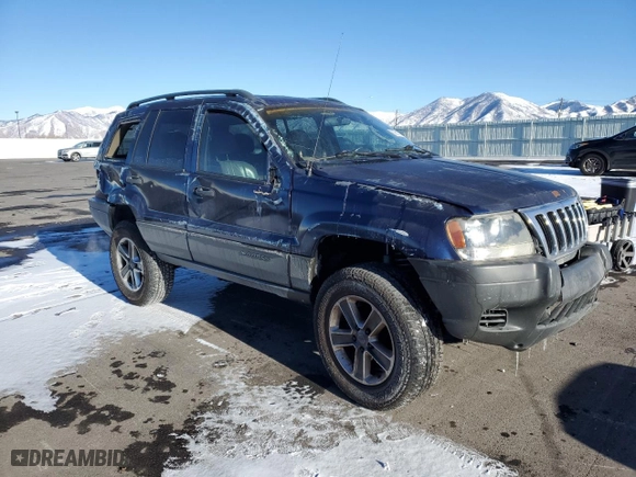 2004 Jeep Grand Cherokee Laredo with VIN 1J4GW48S44C325808, listed as a Copart auction lot 89351575 with 312,011 mi miles and Salvage Title. Bid and sale history available at carsss.com. Image 4.
