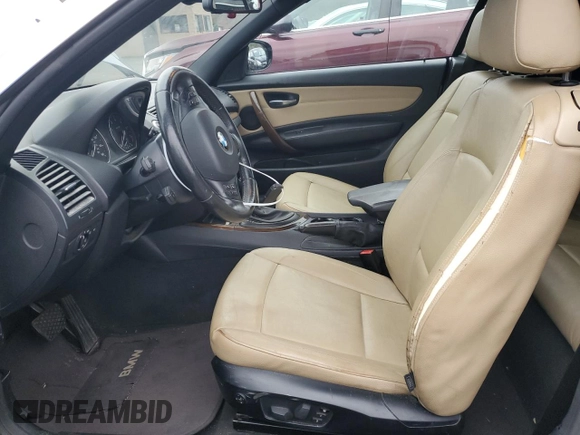 2011 BMW 1 Series 128i with VIN WBAUN1C59BVH82496, listed as a Copart auction lot 83407084 with 123,160 mi miles and Salvage Title. Bid and sale history available at carsss.com. Image 7.