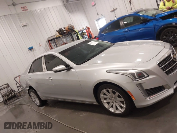2014 Cadillac CTS Luxury AWD with VIN 1G6AX5SX3E0181029, listed as a IAAI auction lot 41895745 with 68,799 mi miles and . Bid and sale history available at DreamBid. Image 13.
