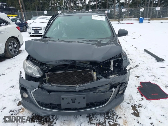 2018 Chevrolet Sonic LT z VIN 1G1JD6SB4J4106822, wystawiony jako IAAI lot #41591103 z przebiegiem 74 497 mil mil oraz . Historia ofert i sprzedaży dostępna na DreamBid. Obrazek 13.
