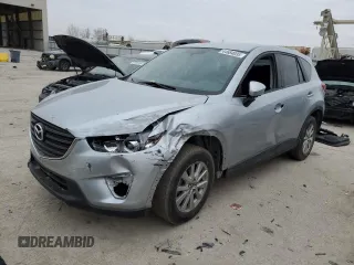 2016 Mazda CX-5 Touring z VIN JM3KE2CY1G0919000, wystawiony jako Copart lot #44684035 z przebiegiem 101 388 mil mil oraz Szkoda całkowita • Salvage title. Historia ofert i sprzedaży dostępna na DreamBid. Obrazek 1.