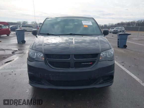 2015 Dodge Grand Caravan SE with VIN 2C4RDGBG8FR669355, listed as a IAAI auction lot 41486867 with 189,650 mi miles and . Bid and sale history available at DreamBid. Image 12.