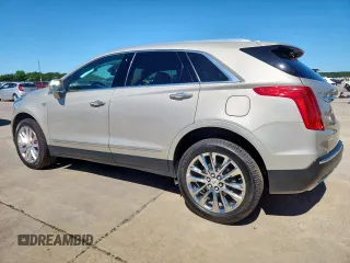 2017 Cadillac XT5 Platinum AWD z VIN 1GYKNFRS0HZ111747, wystawiony jako Copart lot #57666415 z przebiegiem 72 632 mil mil oraz Szkody całkowita. Historia ofert i sprzedaży dostępna na DreamBid. Obrazek 2.
