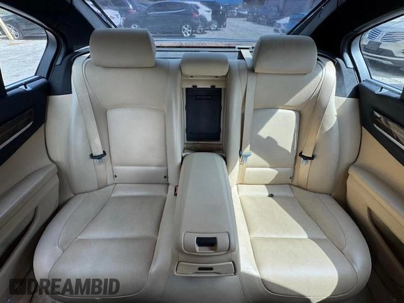 2015 BMW 7 Series 750i xDrive with VIN WBAYB6C5XFD965910, listed as a Copart auction lot 55407895 with 173,486 mi miles and Salvage Title. Bid and sale history available at carsss.com. Image 10.