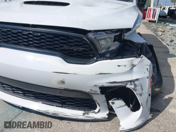 2021 Dodge Durango SRT 392 with VIN 1C4SDJGJ8MC724105, listed as a IAAI auction lot 41883925 with 31,184 mi miles and . Bid and sale history available at DreamBid. Image 6.