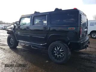 2005 Hummer H2 SUV with VIN 5GRGN23U35H111403, listed as a Copart auction lot 84720994 with 142,159 mi miles and Salvage Title. Bid and sale history available at carsss.com. Image 2.