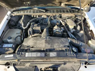 1995 GMC Sonoma SLS z VIN 1GTCS1948S8533169, wystawiony jako Copart lot #58241305 z przebiegiem 192 037 mil mil oraz Tytuł czysty. Historia ofert i sprzedaży dostępna na DreamBid. Obrazek 11.