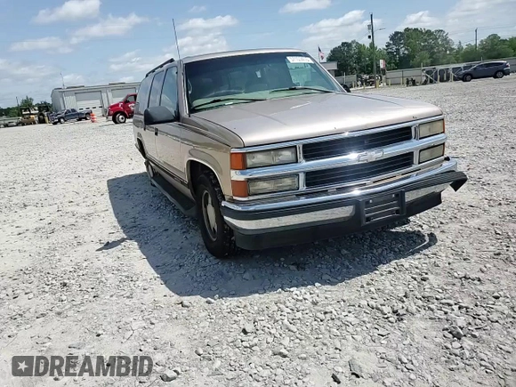 1999 Chevrolet Suburban with VIN 3GNEC16R6XG205408, listed as a Copart auction lot 57169415 with 303,412 mi miles and Salvage title. Bid and sale history available at DreamBid. Image 14.