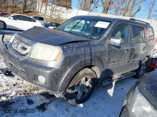 2011 Honda Pilot EX-L with VIN 5FNYF4H53BB009871, listed as a IAAI auction lot 41610433 with 203,671 mi miles. Bid and sale history available at carsss.com. Image 17.