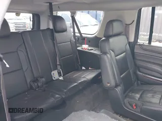 2015 Chevrolet Suburban LT z VIN 1GNSKJKC9FR245097, wystawiony jako IAAI lot #42468168 z przebiegiem 198 454 mil mil oraz . Historia ofert i sprzedaży dostępna na DreamBid. Obrazek 8.
