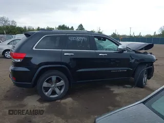 2014 Jeep Grand Cherokee Limited z VIN 1C4RJFBG9EC181218, wystawiony jako IAAI lot #42088591 z przebiegiem 159 909 mil mil oraz . Historia ofert i sprzedaży dostępna na DreamBid. Obrazek 12.