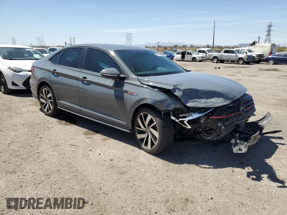 2021 Volkswagen Jetta GLI S с VIN 3VW6T7BUXMM001408, выставлен на аукционе Copart как лот 50454605 с пробегом 73 434 миль миль и Списание • Salvage title. История ставок и продаж доступна на DreamBid. Изображение 4.