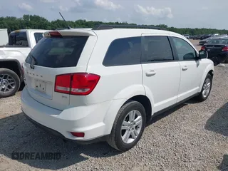 2012 Dodge Journey SXT z VIN 3C4PDCBB0CT323569, wystawiony jako IAAI lot #42748440 z przebiegiem 141 950 mil mil oraz . Historia ofert i sprzedaży dostępna na DreamBid. Obrazek 4.