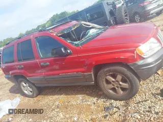 2004 Jeep Grand Cherokee Laredo with VIN 1J4GW48S34C419596, listed as a IAAI auction lot 42515494 with 276,196 mi miles and . Bid and sale history available at DreamBid. Image 13.