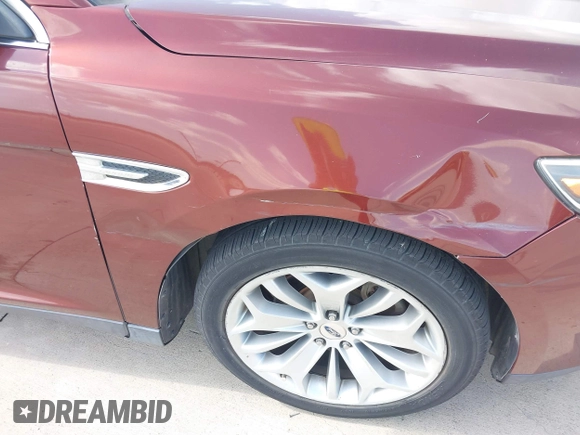 2015 Ford Taurus Limited with VIN 1FAHP2F85FG165586, listed as a IAAI auction lot 42565514 with 183,365 mi miles and . Bid and sale history available at DreamBid. Image 6.