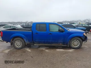 2014 Nissan Frontier SL z VIN 1N6AD0FVXEN705391, wystawiony jako IAAI lot #41539414 z przebiegiem 48 555 mil mil oraz . Historia ofert i sprzedaży dostępna na DreamBid. Obrazek 13.