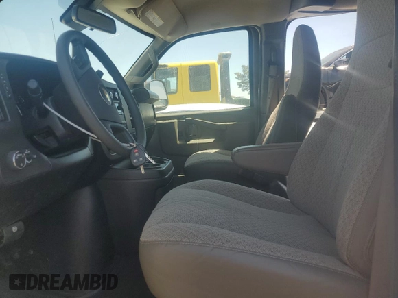 2019 Chevrolet Express Passenger LT with VIN 1GAZGPFG4K1252856, listed as a Copart auction lot 57459135 with 159,676 mi miles and Salvage title. Bid and sale history available at DreamBid. Image 7.