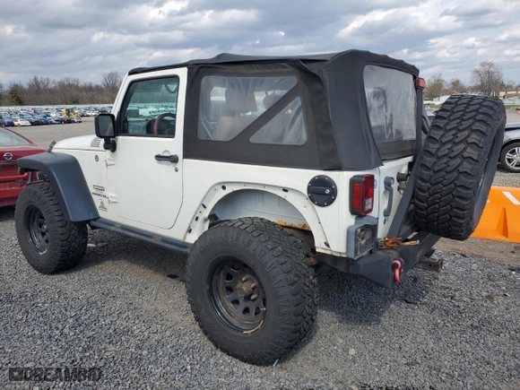 2010 Jeep Wrangler Mountain with VIN 1J4AA2D17AL145255, listed as a Copart auction lot 50129645 with 82,003 mi miles and Clean Title. Bid and sale history available at carsss.com. Image 2.