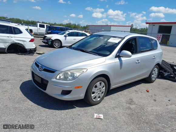 2011 Hyundai Elantra Touring GL with VIN KMHDB8AE9BU105082, listed as a IAAI auction lot 41889297 with 84,018 mi miles. Bid and sale history available at carsss.com. Image 17.