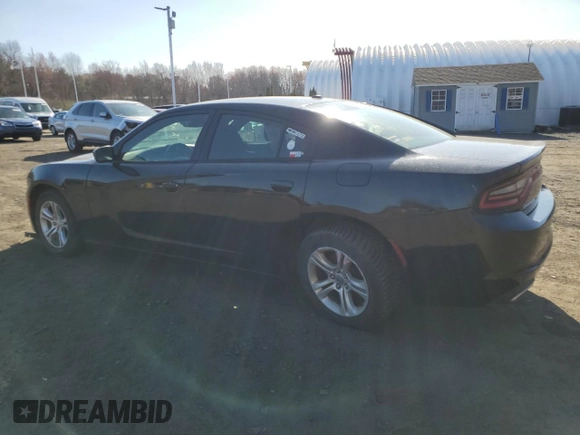 2015 Dodge Charger SE with VIN 2C3CDXBGXFH870769, listed as a Copart auction lot 53486975 with 102,323 mi miles and Salvage Title. Bid and sale history available at carsss.com. Image 2.