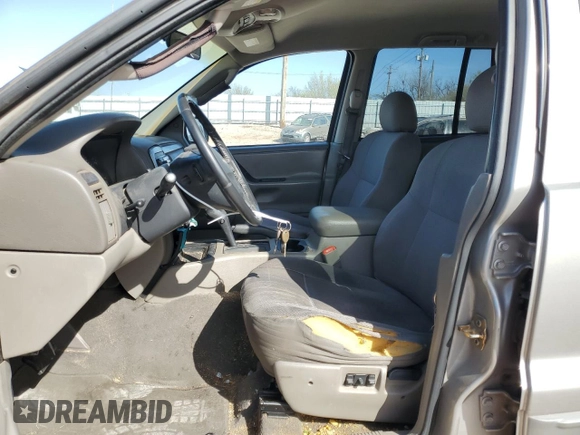 2002 Jeep Grand Cherokee with VIN 1J4GX38S82C178199, listed as a Copart auction lot 48996515 with 299,780 mi miles and Salvage title. Bid and sale history available at DreamBid. Image 7.