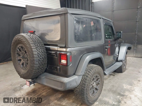 2021 Jeep Wrangler Sport S with VIN 1C4HJXAG2MW502452, listed as a IAAI auction lot 42031159 with 87,952 mi miles and . Bid and sale history available at DreamBid. Image 4.