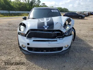 2014 MINI Countryman S with VIN WMWZC3C53EWP52333, listed as a Copart auction lot 54418495 with 34,687 mi miles and Salvage Title. Bid and sale history available at DreamBid. Image 5.