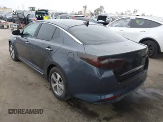 2014 Kia Optima LX z VIN KNAGM4AD8E5065584, wystawiony jako IAAI lot #42287890 z przebiegiem 134 565 mil mil oraz . Historia ofert i sprzedaży dostępna na DreamBid. Obrazek 3.