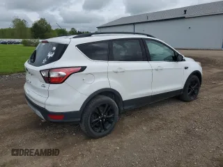 2018 Ford Escape SE z VIN 1FMCU9G97JUB48596, wystawiony jako Copart lot #56388505 z przebiegiem 96 996 mil mil oraz Czysty tytuł • Clean title. Historia ofert i sprzedaży dostępna na DreamBid. Obrazek 3.