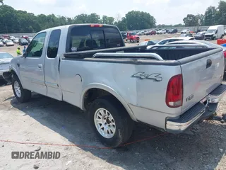 2000 Ford F-150 XL with VIN 1FTRX18L1YNA13975, listed as a IAAI auction lot 42397187 with 235,471 mi miles and . Bid and sale history available at DreamBid. Image 3.
