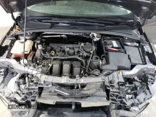 2012 Ford Focus SE z VIN 1FAHP3F28CL444261, wystawiony jako Copart lot #61174145 z przebiegiem 77 612 mil mil oraz Szkoda całkowita • Salvage title. Historia ofert i sprzedaży dostępna na DreamBid. Obrazek 11.