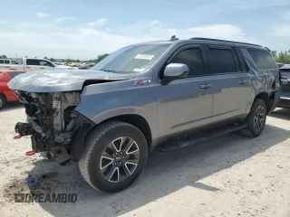 2022 Chevrolet Suburban Z71 with VIN 1GNSKDKD3NR148101, listed as a Copart auction lot 52329935 with 123,112 mi miles and Salvage Title. Bid and sale history available at carsss.com. Image 1.