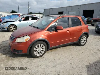 2013 Suzuki SX4 with VIN JS2YB5A42D6100038, listed as a Copart auction lot 73148344 with 141,675 mi miles and Salvage Title. Bid and sale history available at DreamBid. Image 1.