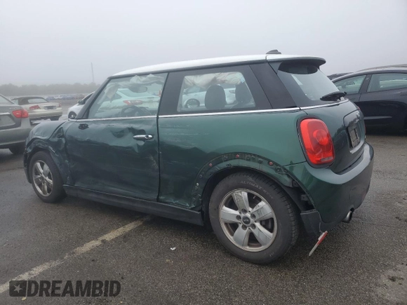 2017 MINI Hardtop Cooper with VIN WMWXP5C55H2D16587, listed as a Copart auction lot 60855195 with 77,769 mi miles and Salvage title. Bid and sale history available at DreamBid. Image 2.