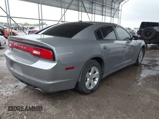 2014 Dodge Charger SE with VIN 2C3CDXBG5EH363292, listed as a IAAI auction lot 41888279 with 129,128 mi miles. Bid and sale history available at carsss.com. Image 4.