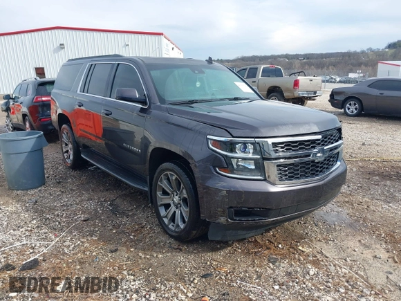 2015 Chevrolet Suburban LT with VIN 1GNSKJKC8FR717435, listed as a IAAI auction lot 41313726 with 120,731 mi miles and . Bid and sale history available at DreamBid. Image 1.