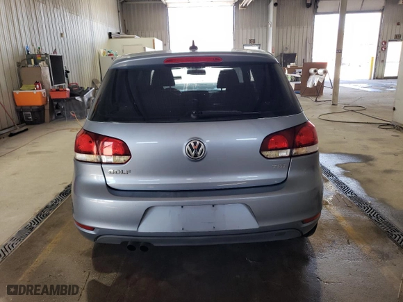 2012 Volkswagen Golf TDI w/Tech Pkg with VIN WVWMM7AJ2CW113181, listed as a Copart auction lot 52576855 with 100,589 mi miles and Salvage Title. Bid and sale history available at carsss.com. Image 6.